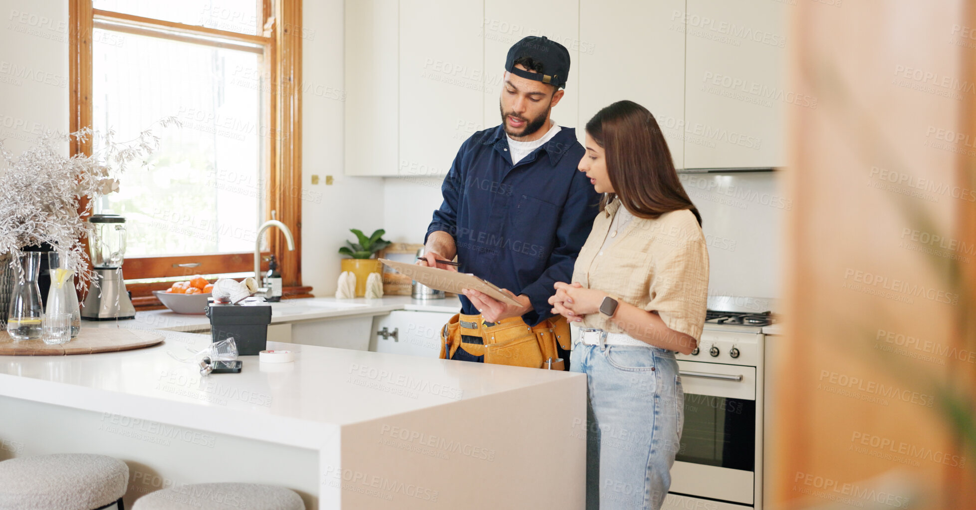 Buy stock photo Woman, kitchen and plumber with contract on clipboard for maintenance service, information and repairs. House, discussion and man with notes in checklist for renovation, inspection or client feedback