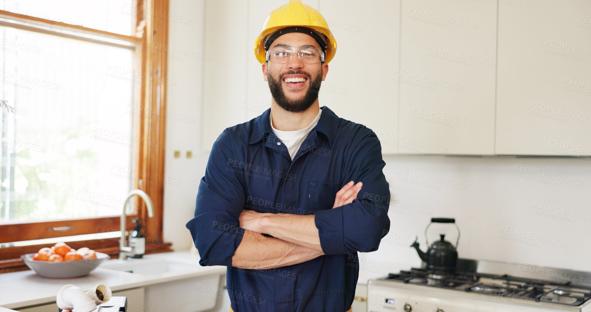 Buy stock photo Kitchen, man and happy with arms crossed as plumber for home repairs and diy in Mexico. Male person, small business and smile or confident in portrait for renovation, maintenance and handyman skills