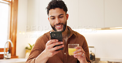 Buy stock photo Home, juice and man with smartphone, smile and internet with social media, wellness and texting. Apartment, person and guy with cellphone, online reading for news and message to contact and healthy