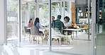 Boardroom, development and meeting with business people in office for discussion or planning. Collaboration, seminar or workshop with corporate men and women in workplace for strategy or vision