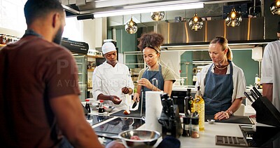 Buy stock photo Cooking, course or chef teaching woman in kitchen for knife skills, cutting technique or learning process. Culinary class, people or mentor with lesson on food preparation or education in hospitality