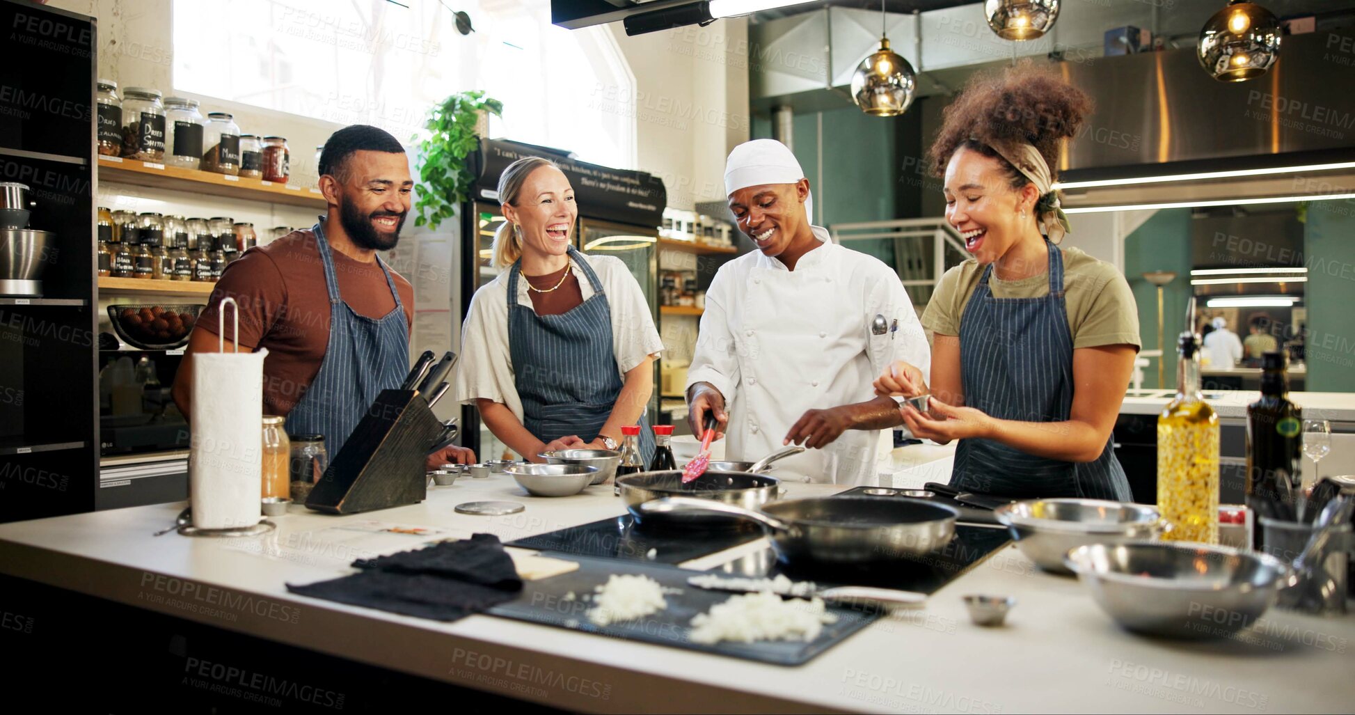 Buy stock photo Cooking, class and chef in kitchen with people for meal preparation, teaching gourmet recipe or learning skills. Culinary course, laughing or mentor with lesson on food education or cuisine knowledge