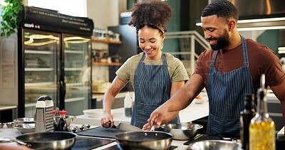 Buy stock photo Happy, chef and helping in kitchen, cooking and listening to instruction, mentor or teaching in hospitality. Professional, apprentice and learning of culinary student, smile or skills for fine dining