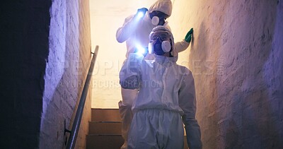 Buy stock photo Hazmat, suit and people for disinfection walking with flashlight on stairs in basement for toxic spill or biohazard chemical inspection. Dark underground, forensic investigation or team with gas mask