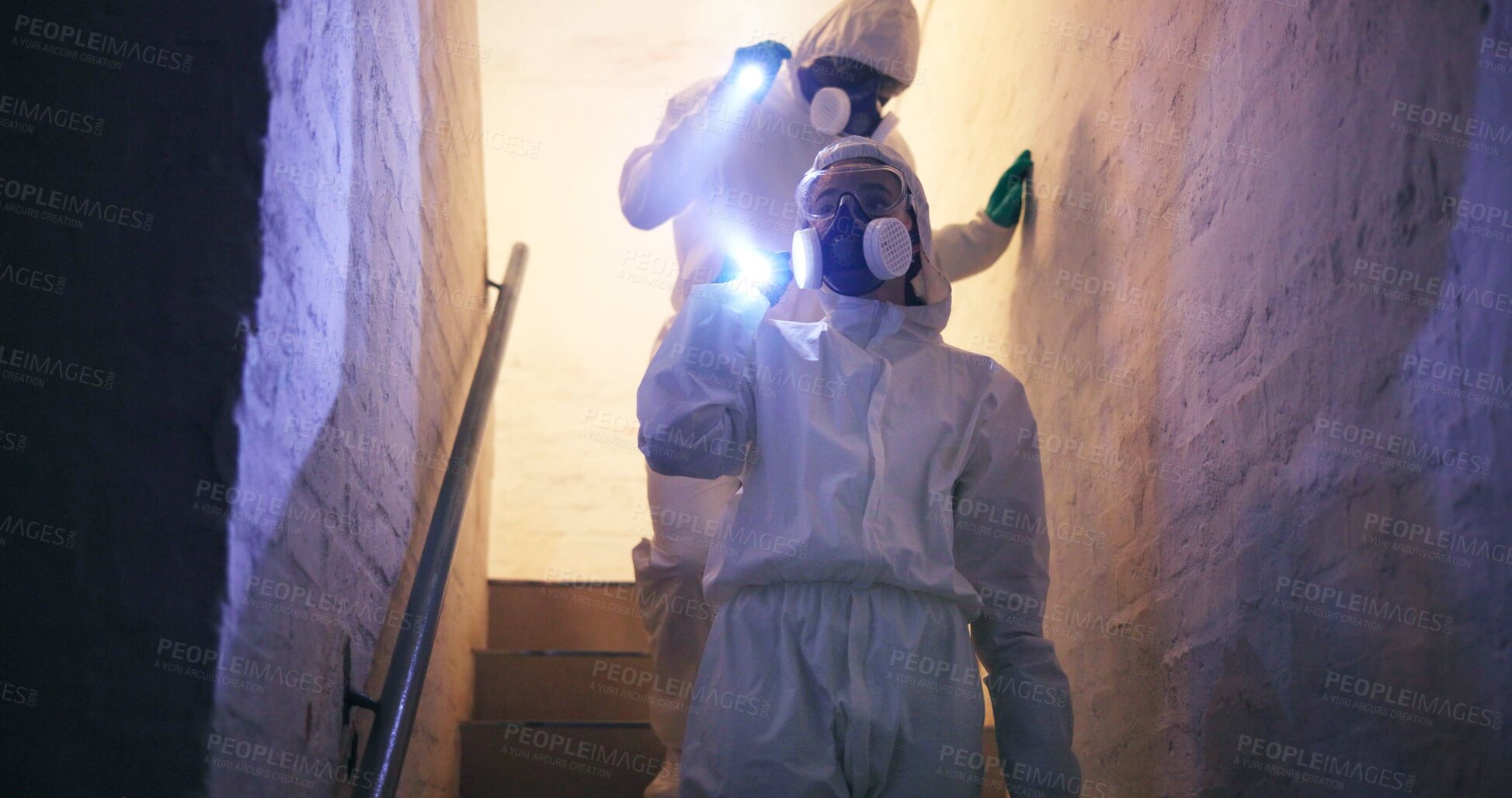 Buy stock photo Hazmat, suit and people for disinfection walking with flashlight on stairs in basement for toxic spill or biohazard chemical inspection. Dark underground, forensic investigation or team with gas mask