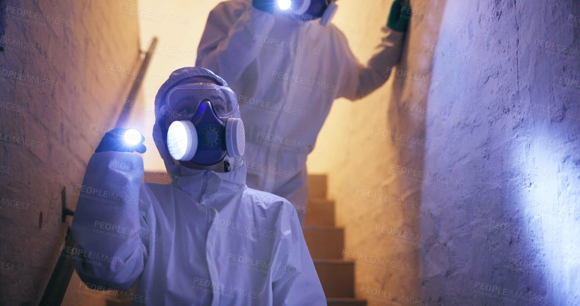 Buy stock photo Hazmat, suit or people for safety walking with flashlight in basement for toxic spill or biohazard chemical inspection. Dark underground, forensic investigation or team with gas mask for disinfection