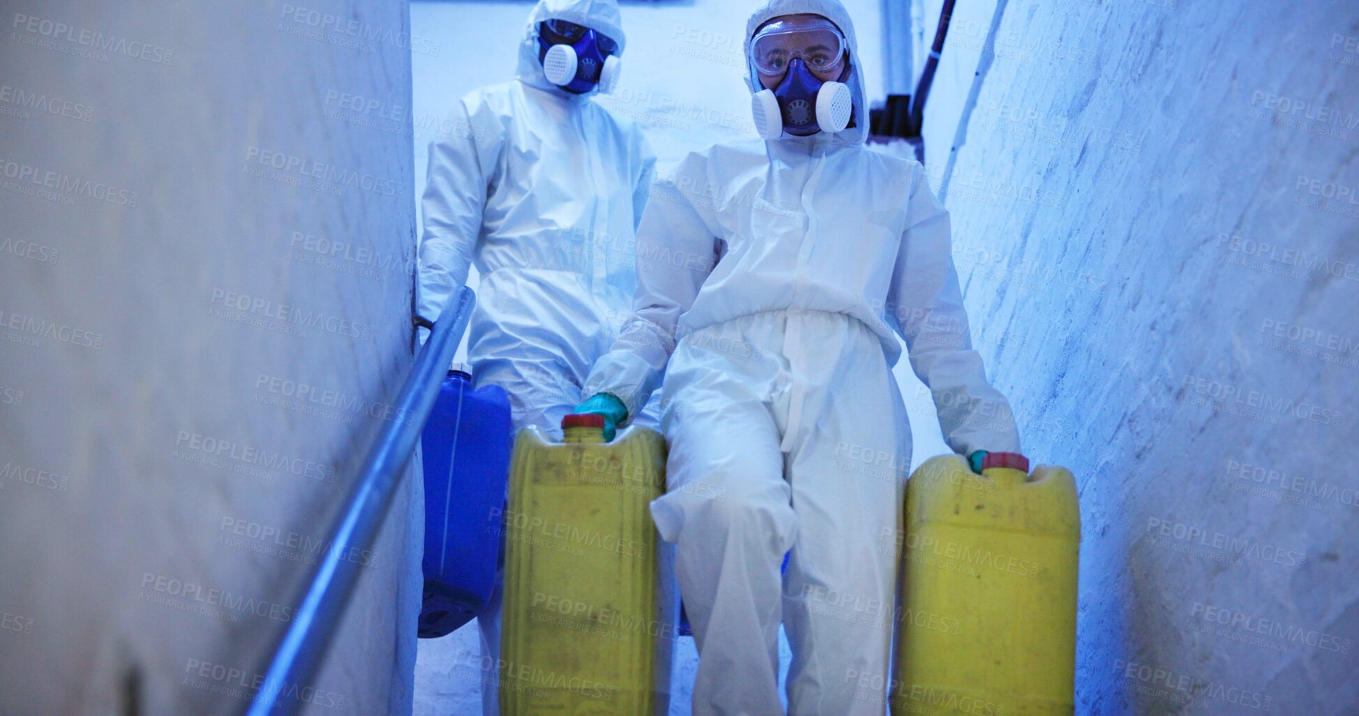 Buy stock photo Chemical portrait, protection and people in hazmat suit on stairs in basement for hazardous waste disposal or toxic spill. Team, forensic investigation and gas mask for safety with dangerous goods