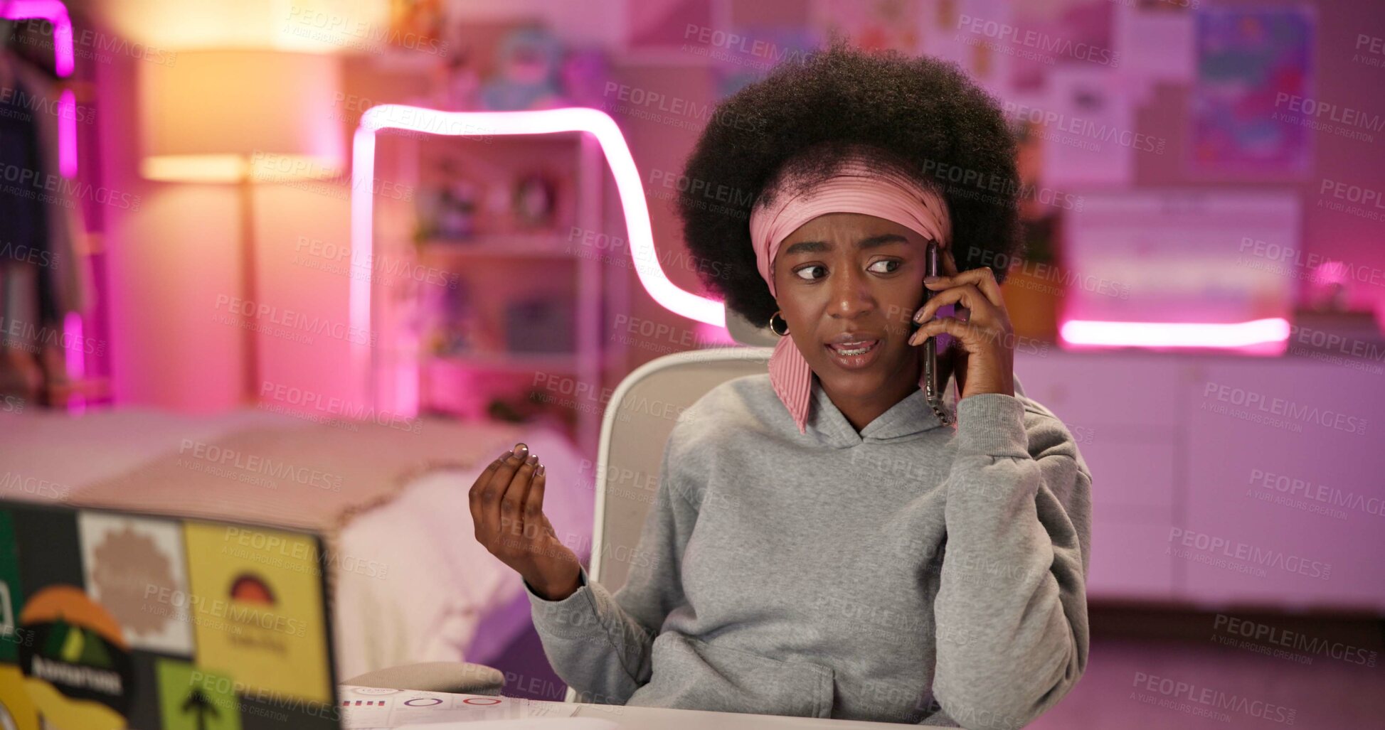 Buy stock photo Laptop, neon and phone call with black woman student in bedroom of home for communication or remote study. Computer, confused and conversation with person at desk in apartment for distance learning