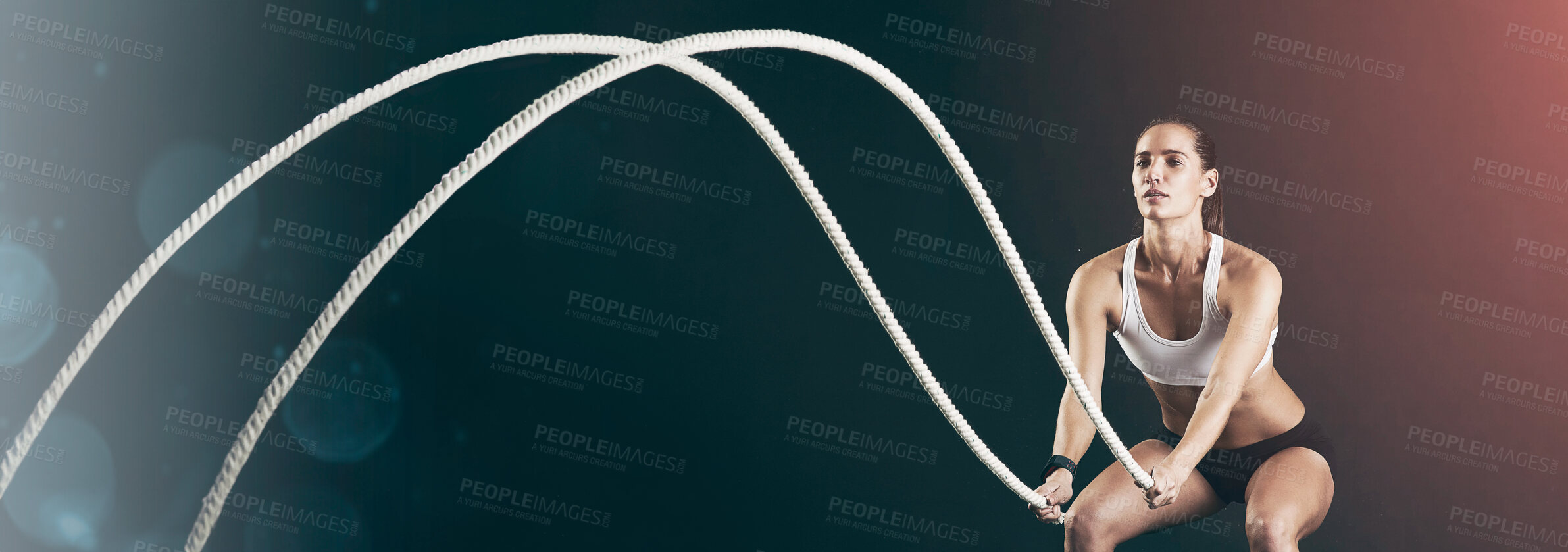 Buy stock photo Woman, studio and training with battle rope for fitness, calorie and body workout for vitality or wellness. Girl, squat and exercise on black background for strength, power and endurance or gym