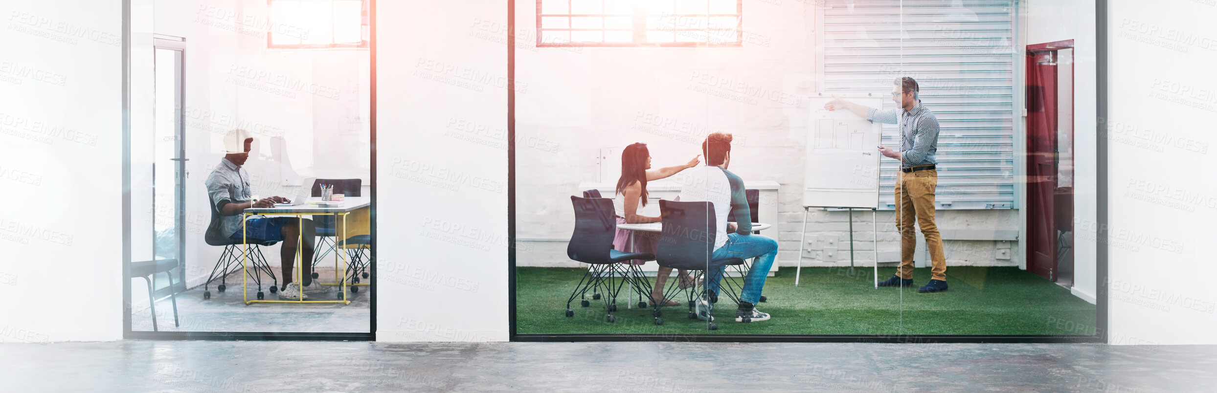 Buy stock photo Shot of a business meeting on the go