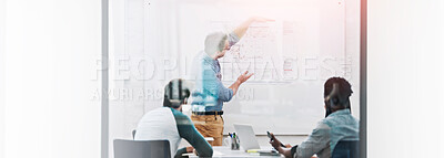 Buy stock photo Cropped shot of a group of architects discussing plans