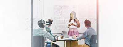 Buy stock photo Cropped shot of a group of architects discussing plans