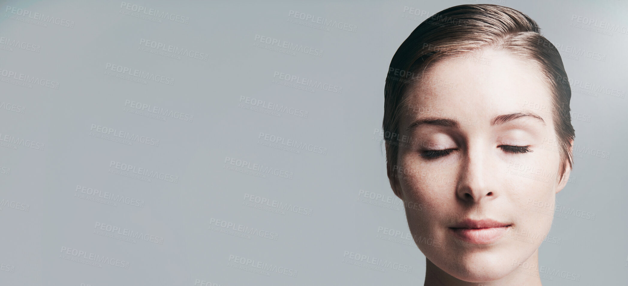 Buy stock photo Woman, relax and studio with skincare on banner for makeup or cosmetics on a gray background. Calm, female person or model with eyes closed for beauty spa, salon or facial treatment on mockup space