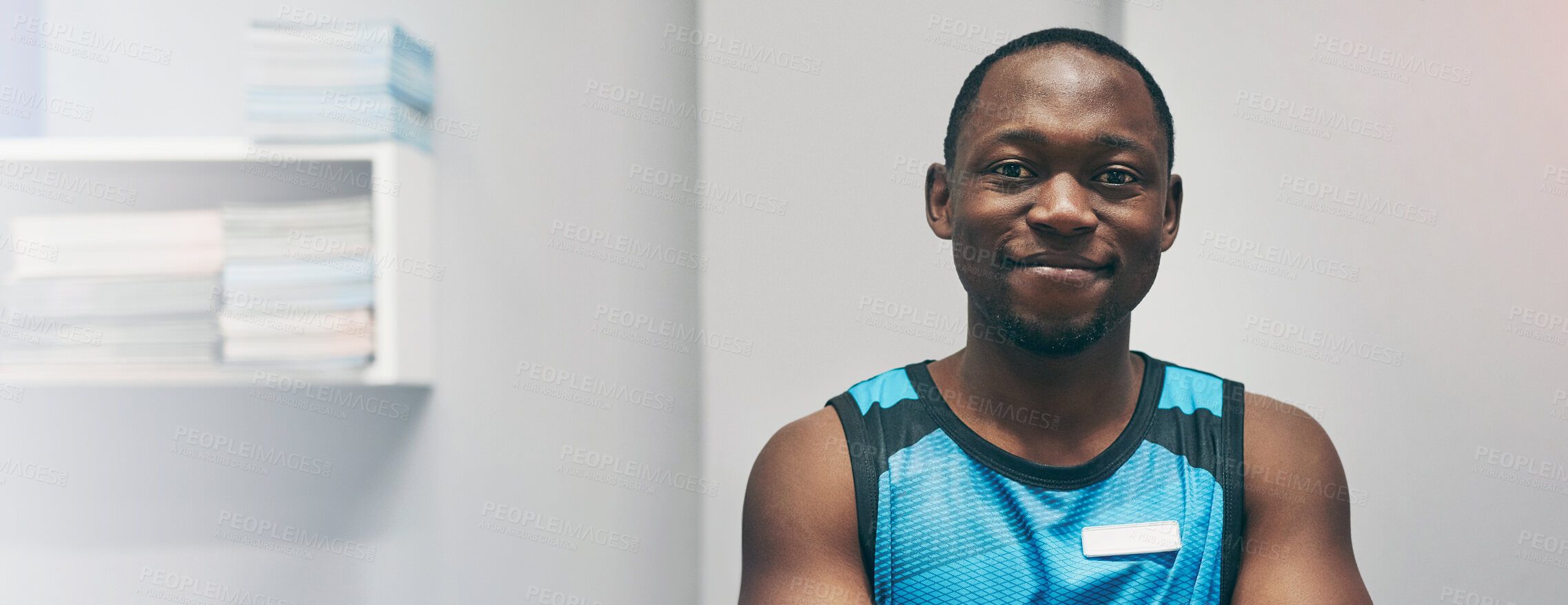 Buy stock photo Portrait of a personal trainer standing in his office at the gym