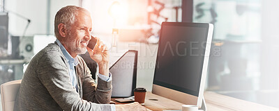 Buy stock photo Shot of a mature businessman talking on the phone while sitting at his desk in an office