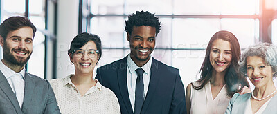 Buy stock photo Portrait of a diverse team of professionals standing together in a modern office