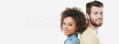 Buy stock photo Studio portrait of an affectionate young couple standing back to back against a white background