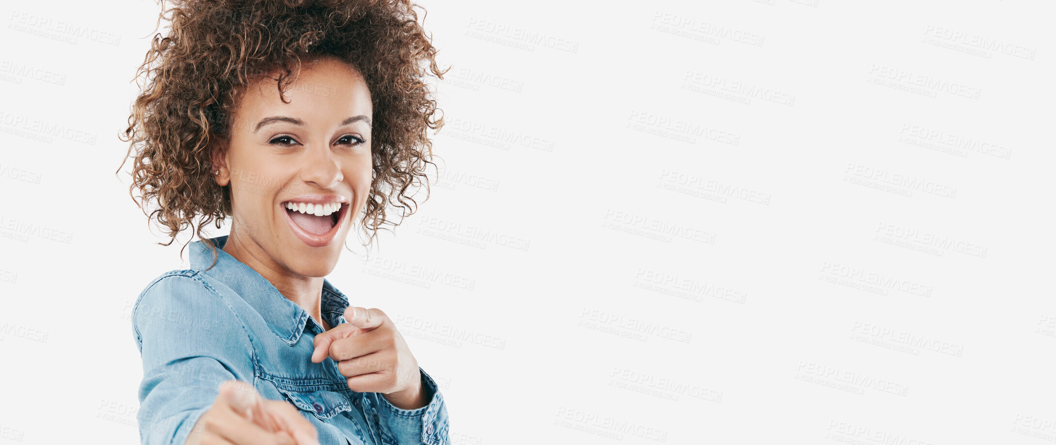 Buy stock photo Studio shot of a young woman pointing towards you