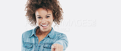 Buy stock photo Studio shot of a young woman pointing towards you