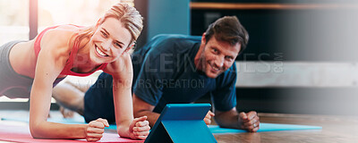 Buy stock photo Shot of a young woman working out at home