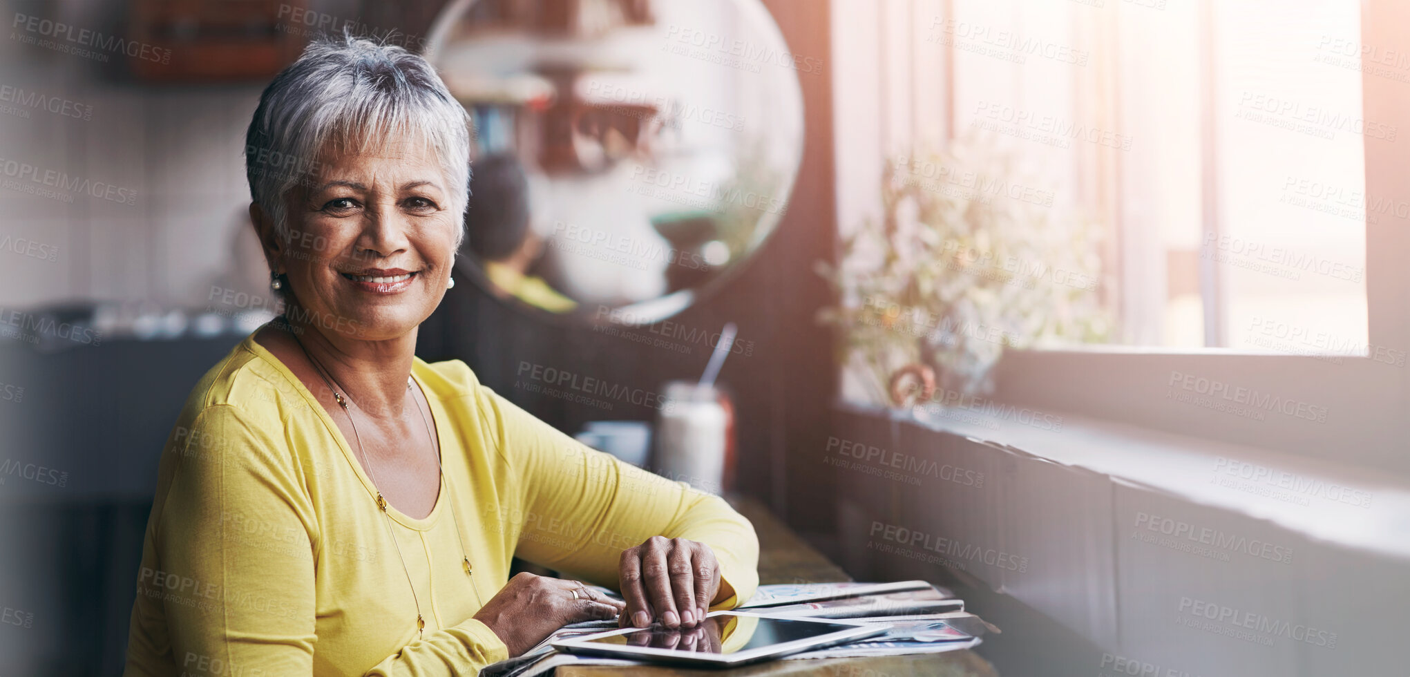 Buy stock photo Portrait, smile and senior woman with a tablet, cafe and online reading with joy, social media or connection. Face, mature female person or elderly lady with technology, happy or relax at coffee shop