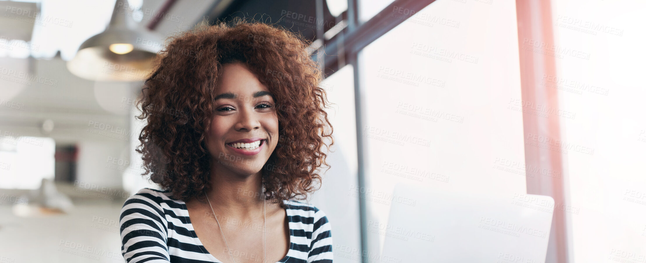 Buy stock photo Portrait, laptop and smile of business woman at table in office for creative career or job in startup. Face, computer and African professional entrepreneur, employee or happy copywriter for research