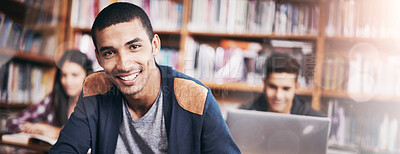 Buy stock photo Cropped portrait of a handsome young student working diligently in his classroom