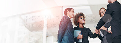 Buy stock photo Cropped shot of businesspeople shaking hands in a modern office