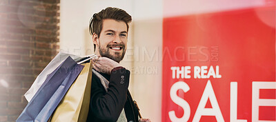 Buy stock photo Portrait of a happy young man on a shopping spree