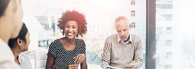 Buy stock photo Shot of a group of coworkers talking together in a meeting in an office