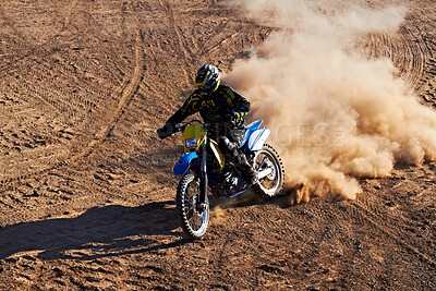 Buy stock photo Man, motorcycle and bike dust cloud as professional rider in action danger competition, fearless or race. Male person, transportation or fast speed dirt adventure or rally, challenge gear or driving