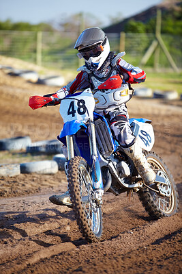 Buy stock photo Person, motorcycle and dirt race track adventure as 
professional in action, danger or fearless risk. Bike rider, off road course and fast speed competition rally, extreme sport gear on sand path