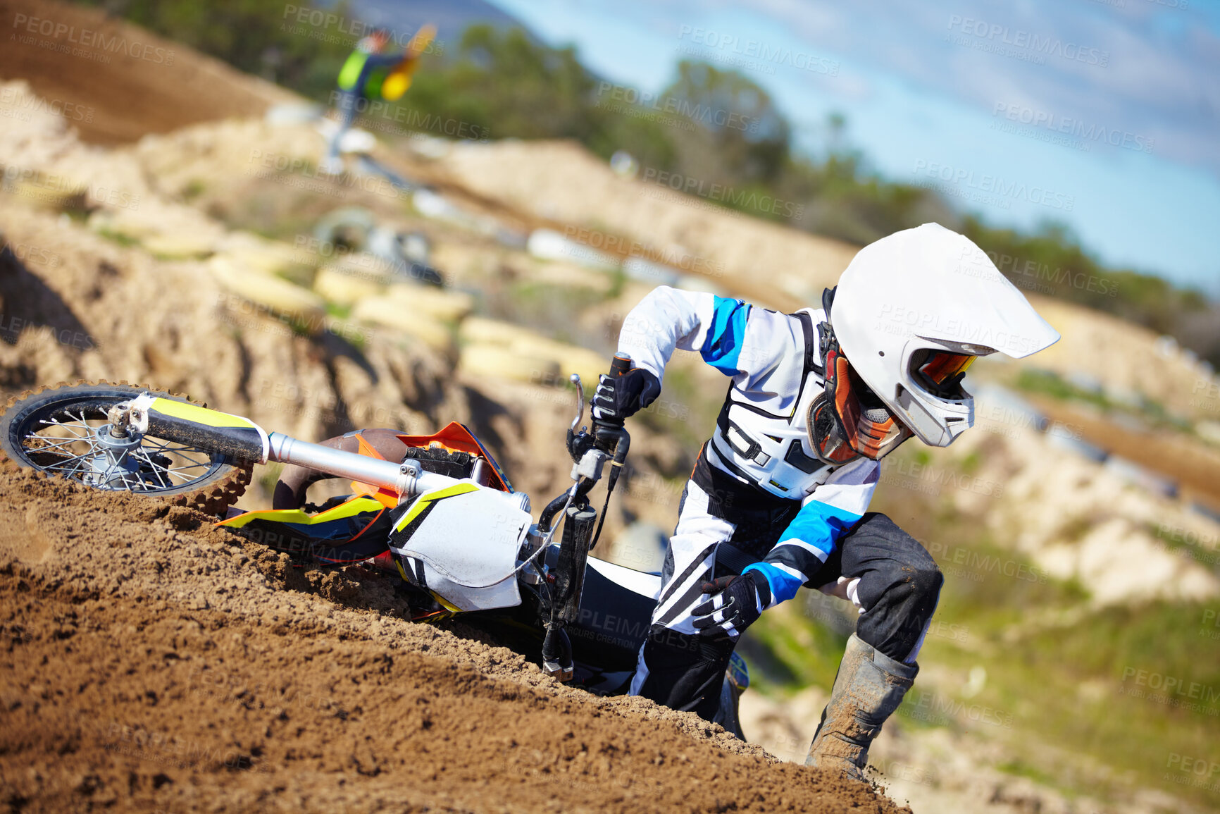 Buy stock photo Accident, fitness and man biker on a dirt road for competition, race or training workout. Sports, motorcycle and frustrated male athlete with mistake on bike in outdoor sand dunes or desert for hobby