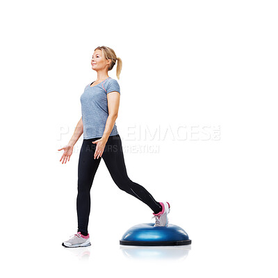 Buy stock photo Athlete, ball or leg exercise in workout for body development isolated on white background in studio. Woman, training equipment or fitness for mockup space, core challenge or wellness for balance