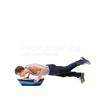 Buy stock photo Man, training and push ups with bosu ball for fitness, exercise or workout on a white studio background. Active male person lifting body weight for strength, muscle or strong arms on mockup space