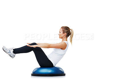 Buy stock photo A young woman balancing on a bosu-ball