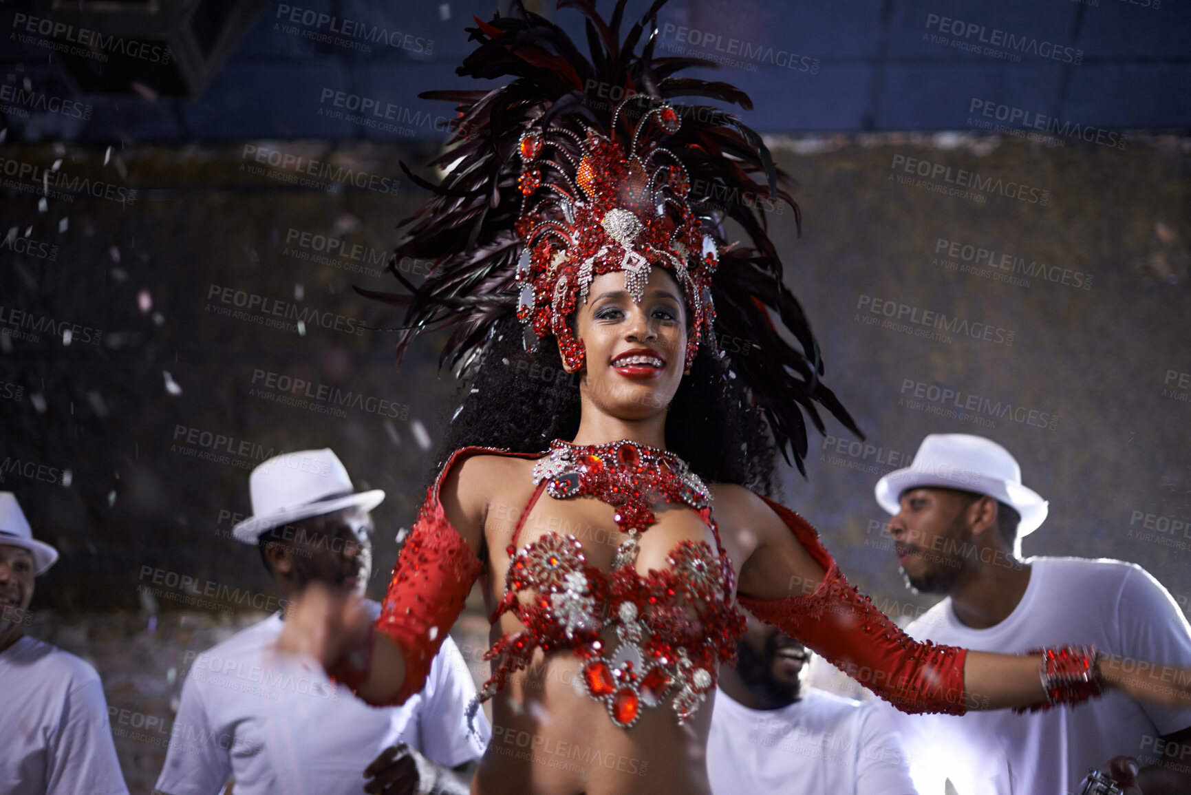 Buy stock photo Woman, dance and samba for music festival, carnival or street performance with costume at night. Excited dancer with drummer or band for event, celebration and culture with confetti in Rio de Janeiro