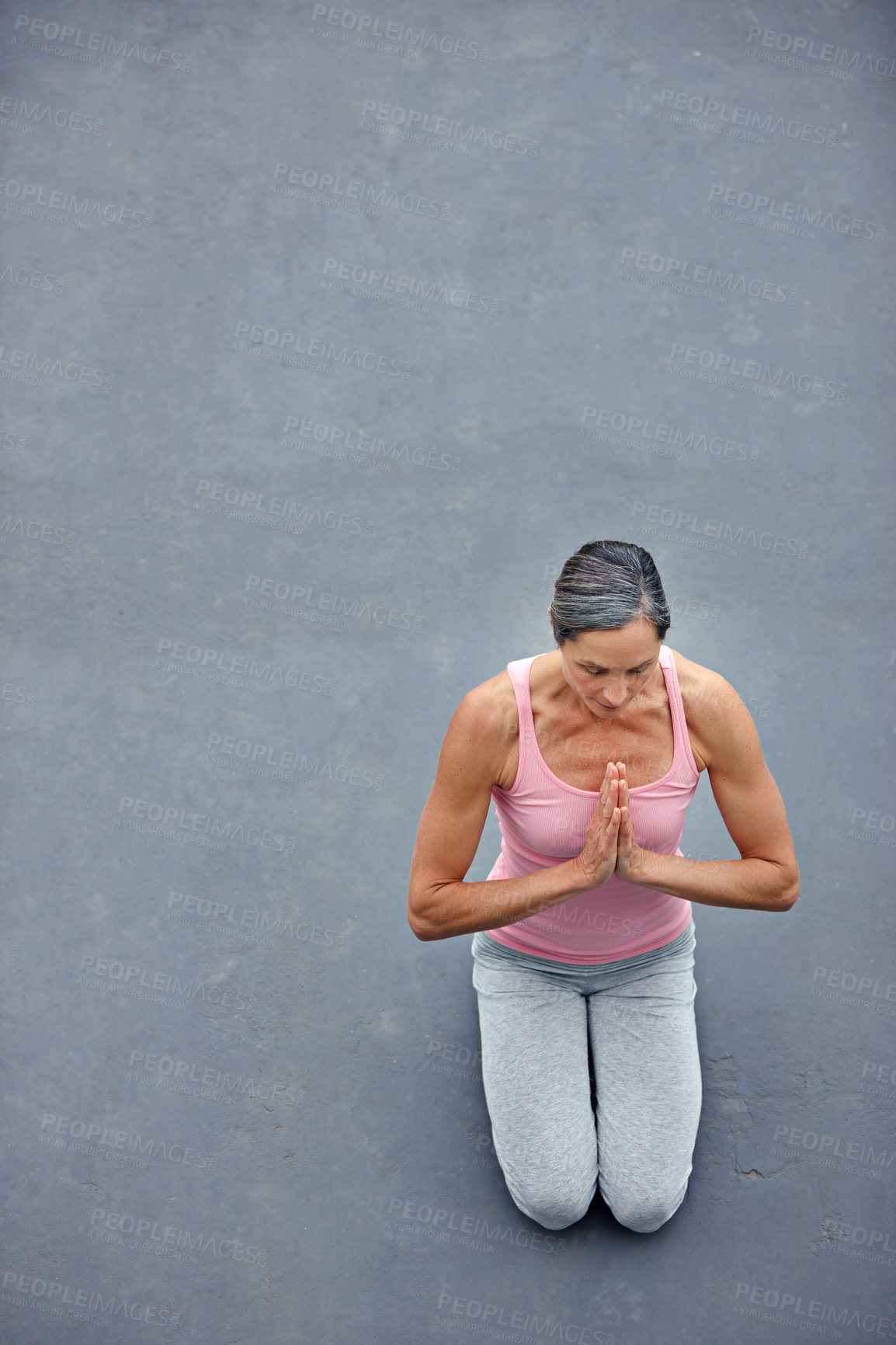 Buy stock photo Above, woman and namaste with yoga outdoor for holistic fitness, mindfulness and peace of morning routine. Mature, person and chakra with meditation, healing and mental health of wellness performance