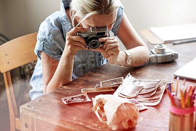 Buy stock photo Album, woman and vintage camera for photography with inspiration for art project, memories and collection. Retro, artist and freelancer in home with pictures, skill and talent for hobby and creative