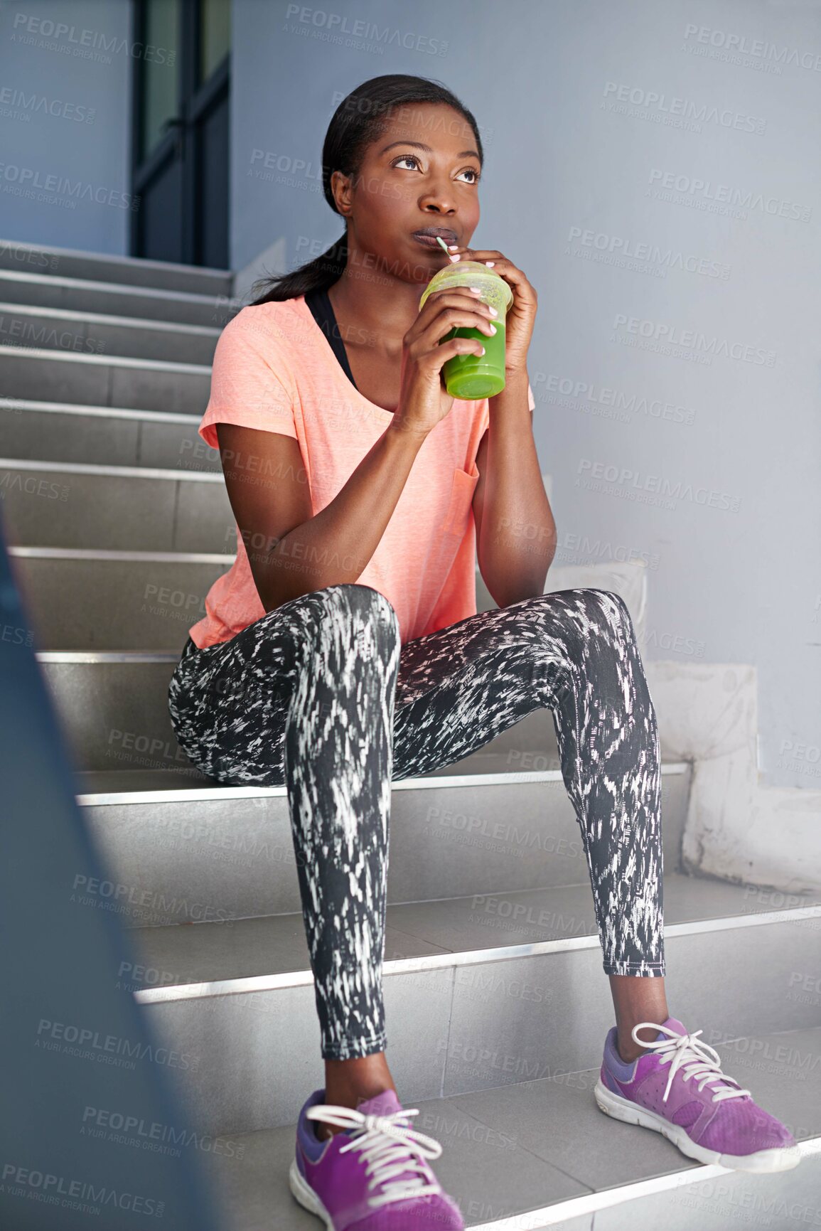 Buy stock photo Black woman, thinking and drinking with smoothie for fitness, detox or hydration in health and wellness on stairs. Young African, female person or wonder with organic beverage for weight loss or diet