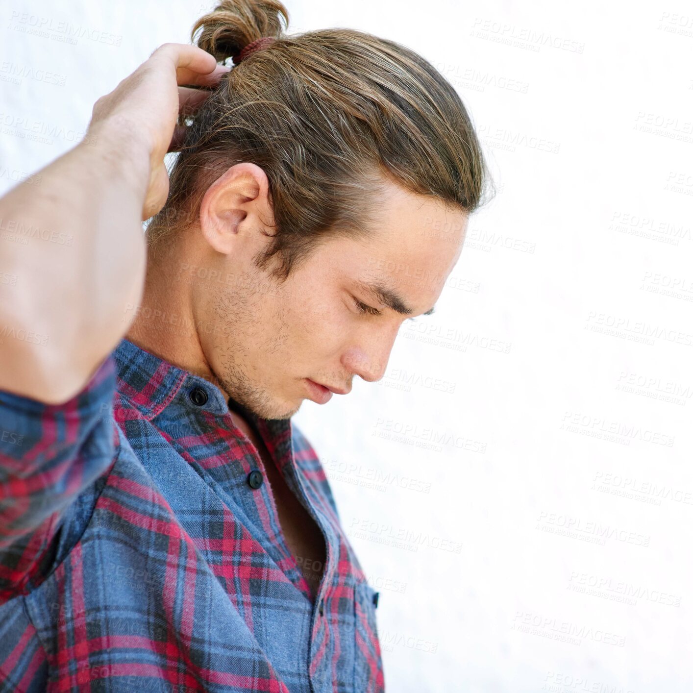 Buy stock photo Fashion, confused and man with plaid shirt, thinking and doubt expression for college student and serious. Wall, contemplating and unsure of scholarship, clothes and person in university or wondering