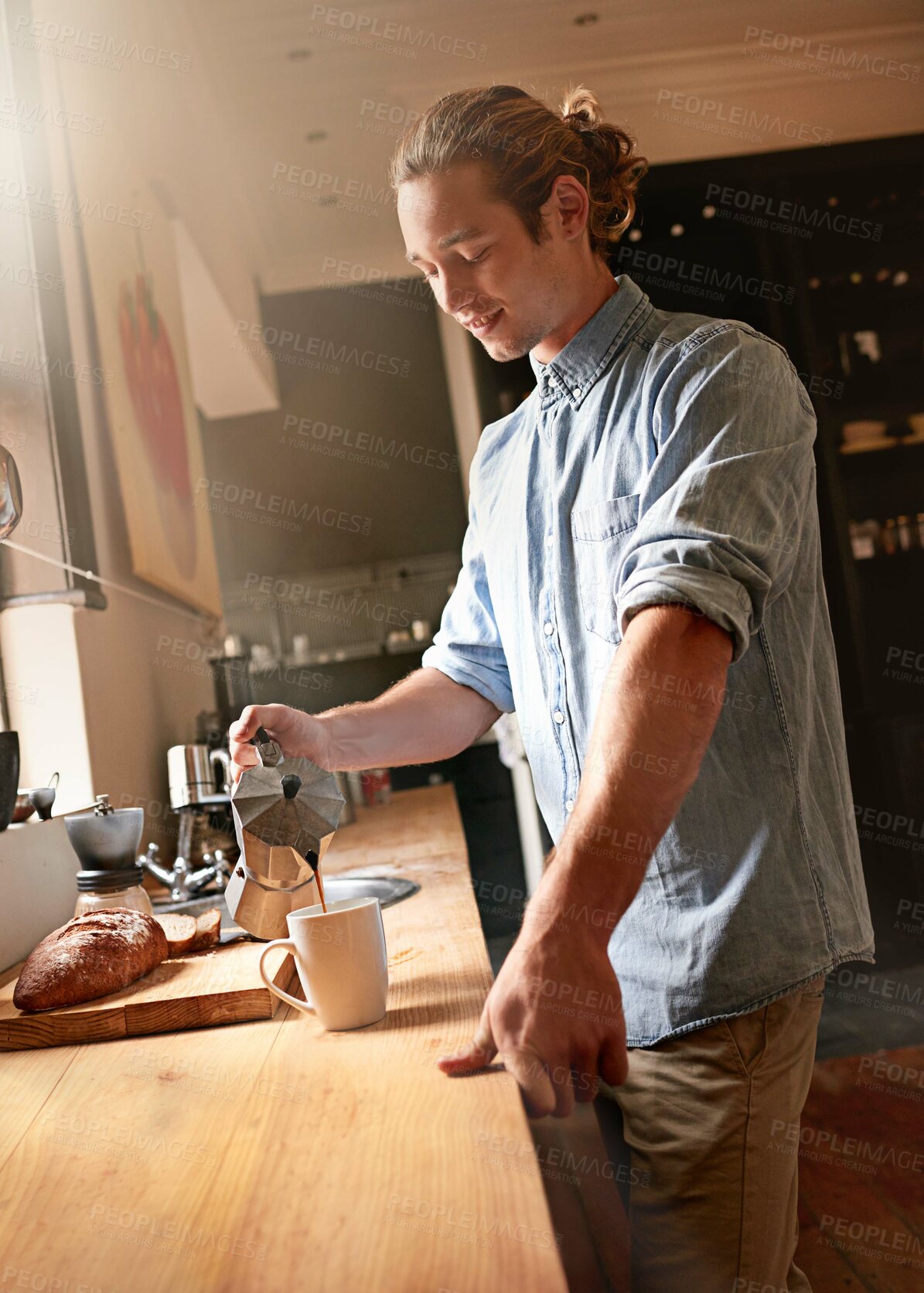 Buy stock photo Man, counter and coffee in home with espresso, mug and hot drink in the morning in kitchen. Breakfast blend, caffeine break and weekend with latte and brewing mocha with thinking and smile with food