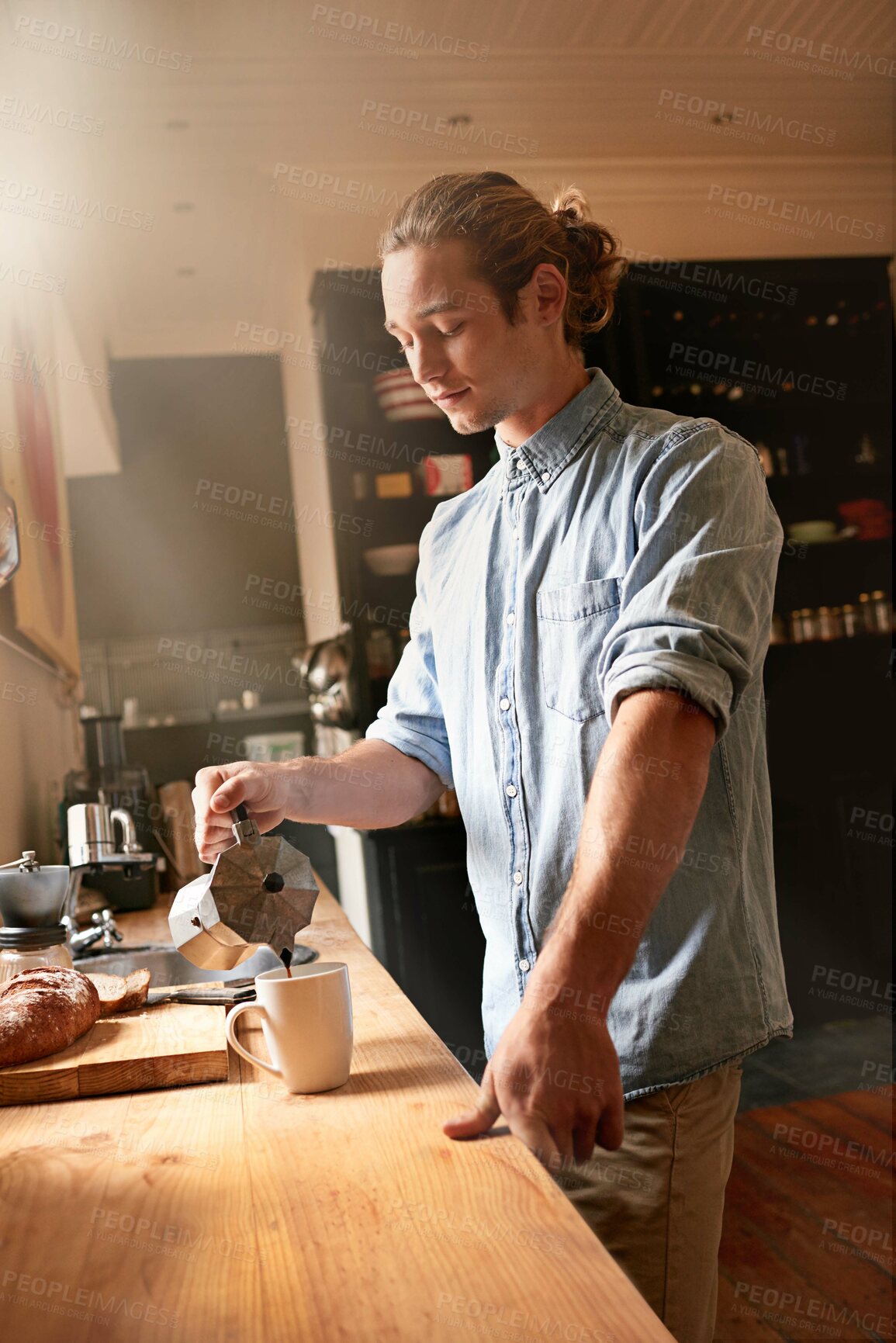 Buy stock photo Man, kitchen counter and coffee in home with espresso, mug and hot drink in the morning. Breakfast blend, caffeine break and weekend with latte and brewing mocha with hipster style of relax guy