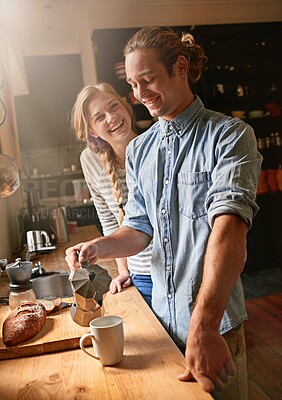 Buy stock photo Home, happy and couple in kitchen with coffee in moka pot for caffeine beverage, warm drink and cappuccino. Apartment, morning and man and woman with prep on counter for breakfast, aroma and espresso