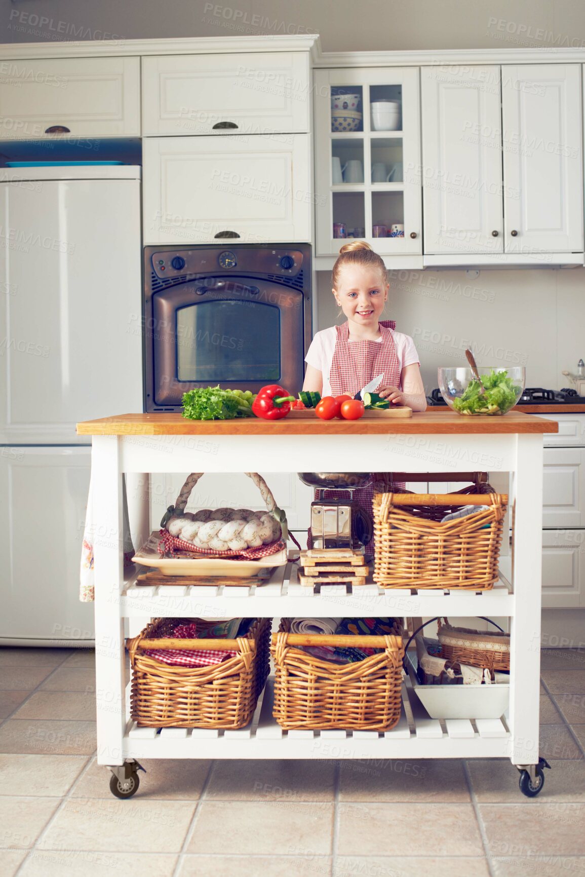 Buy stock photo Vegetables, cooking and portrait of child in kitchen for healthy eating, wellness and vegetarian diet. Happy, vitamins and young girl in home with organic ingredients for lunch, dinner and meal prep