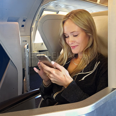 Buy stock photo Airplane, woman and smile with smartphone for travel, holiday adventure and notification for message. Female person, connection and mobile in flight for international journey, transport and digital