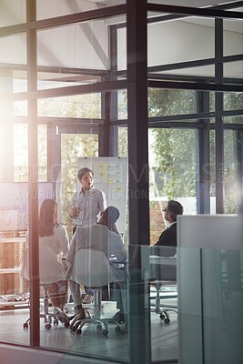 Buy stock photo Shot of a businesswoman giving a presentation in the boardroom