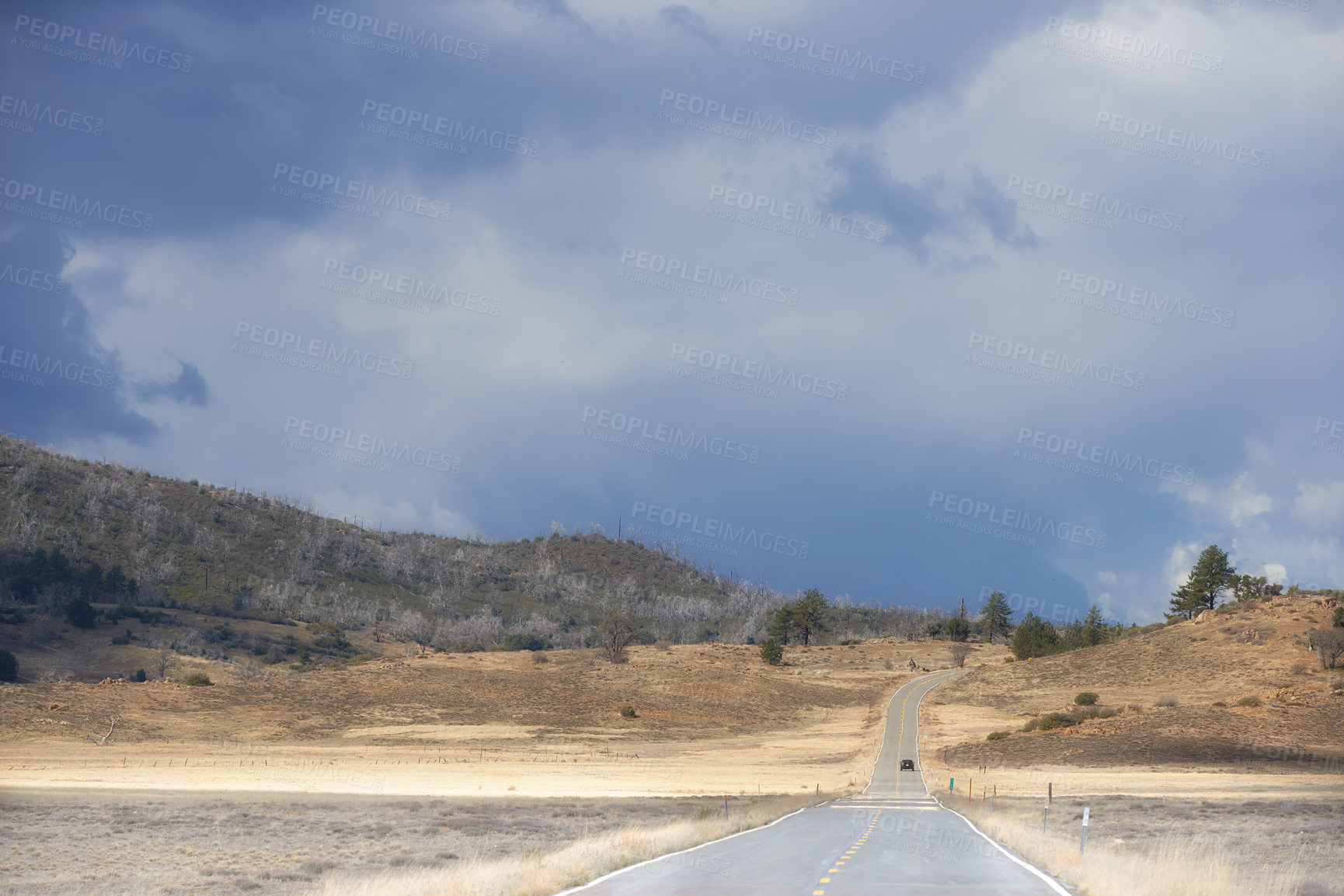 Buy stock photo Road, hill or highway for travel, mountain route and peace in environment, location or adventure. Switzerland, sky or asphalt for journey, transportation or trip on holiday vacation in countryside