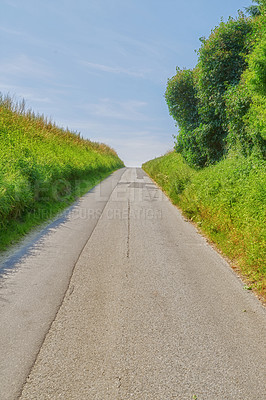 Buy stock photo Road, landscape and blue sky with environment in countryside for travel adventure, roadtrip or driveway. Forest, trees or street for holiday journey, destination or tourism with field for sightseeing