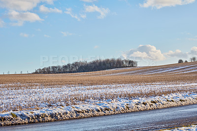 Buy stock photo Nature, countryside and snow with road for adventure, destination and outdoor location for winter journey. Path, sustainability and ecology with frosty field for plants, landscape or travel in Canada